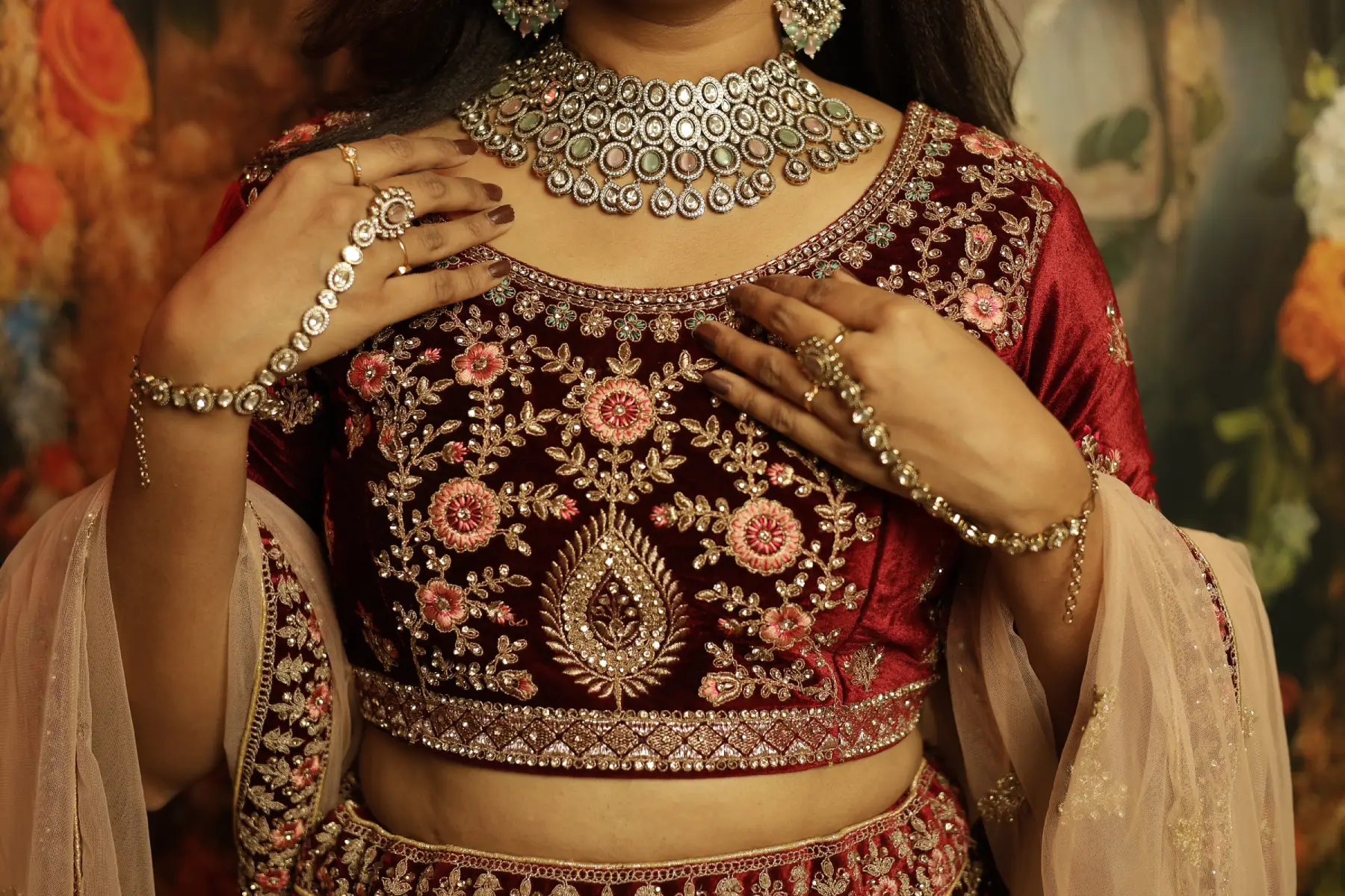 Boat neck blouse with zardozi work and quarter sleeves for traditional weddings.